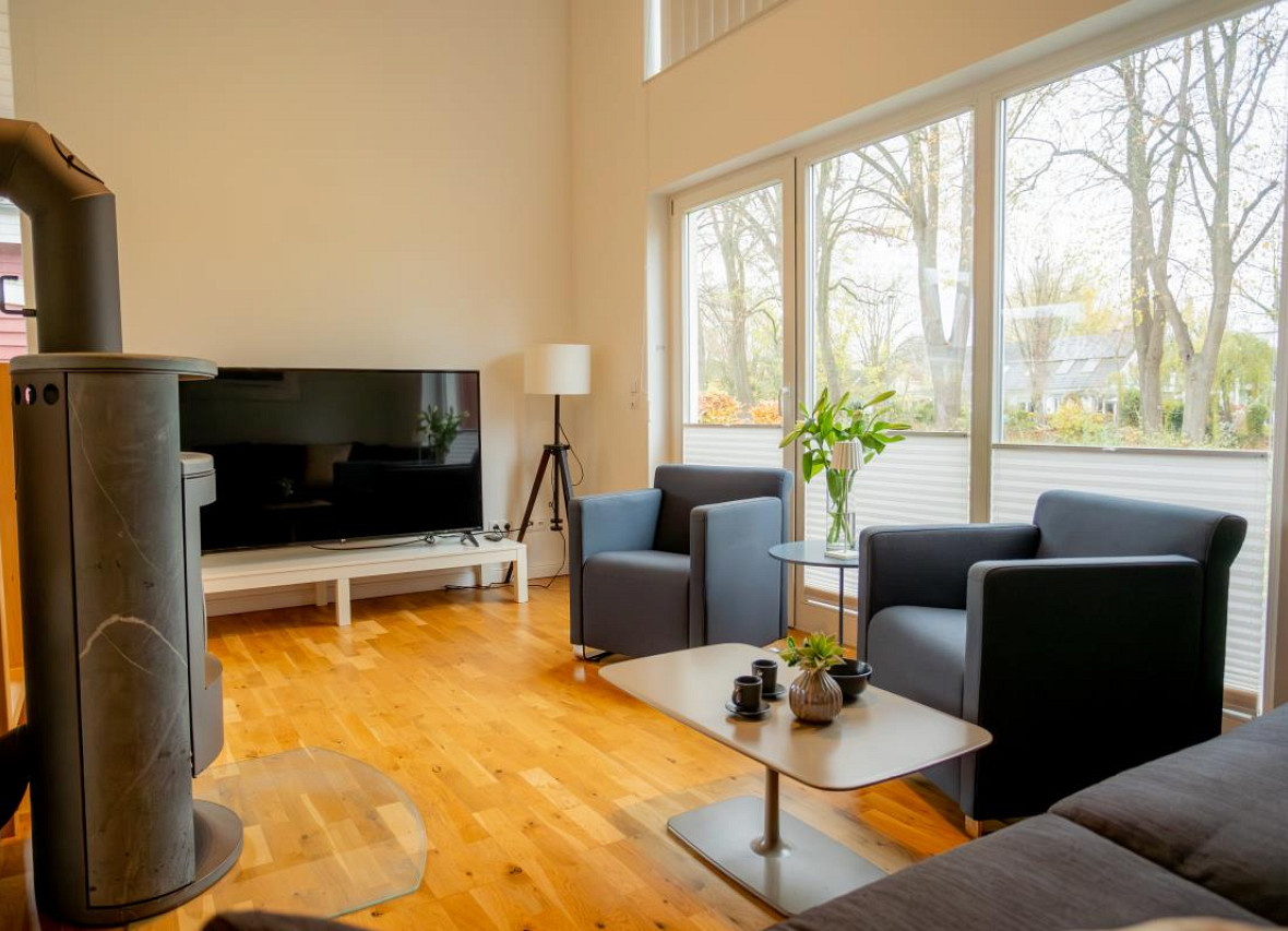 Wohlfühl-Lounge mit Kamin – entspannen im Wohnzimmer von Dock 2